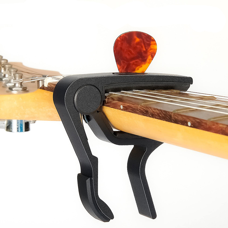 Capodastre pour guitares électriques ou accoustiques, basses, Banjo, Ukulélé ou Manodline