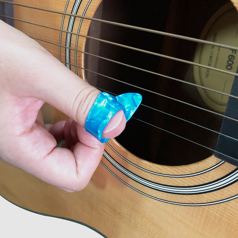 Médiator Pouce pour Guitares acoustique, électrique ou basses - épaisseur 1.2mm