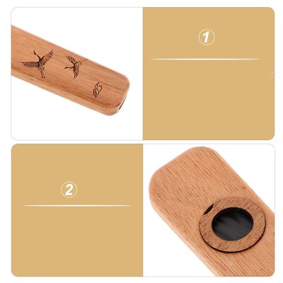 Detalles de Kazoo de Madera Grabado con Motivo de Grullas de Japón y Acabado Artesanal